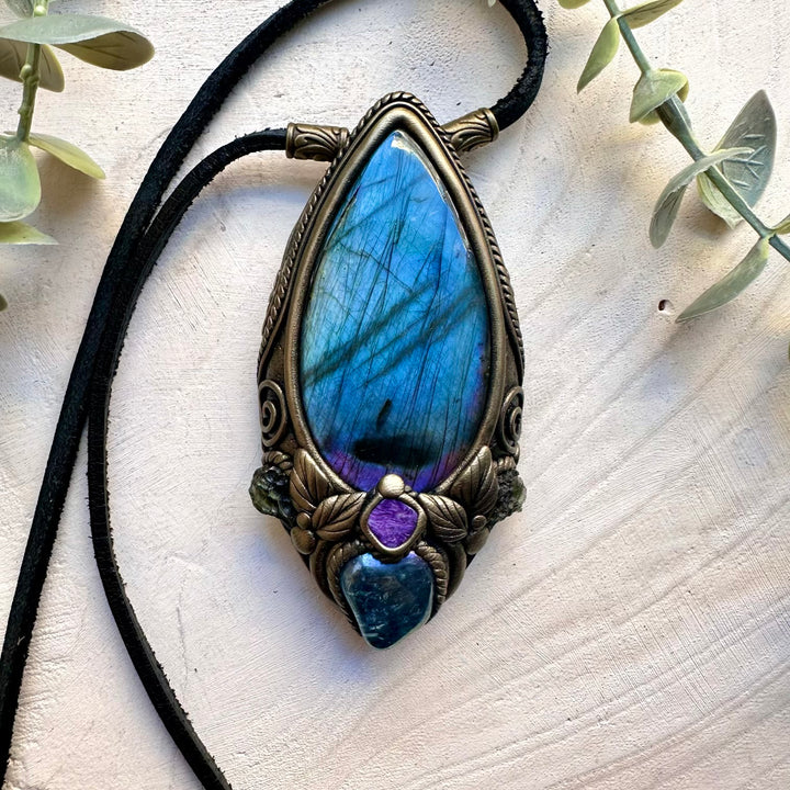 Handmade statement necklace featuring labradorite aqua aura quartz and moldavite