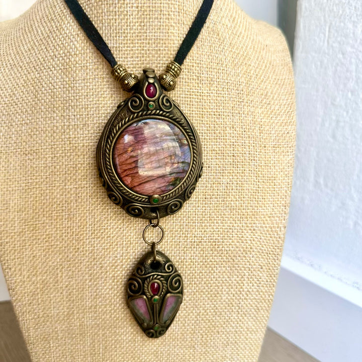 Handmade statement necklace featuring Labradorite, a pair of Watermelon Tourmalines, Rhodolite Garnet and Emerald.