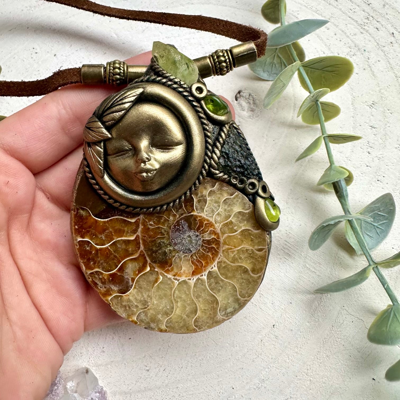 Large ammonite with brazilianite moldavite and peridot goddess pendant necklace