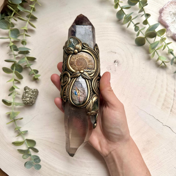 Lemurian quartz wand paired with moldavite and labradorite