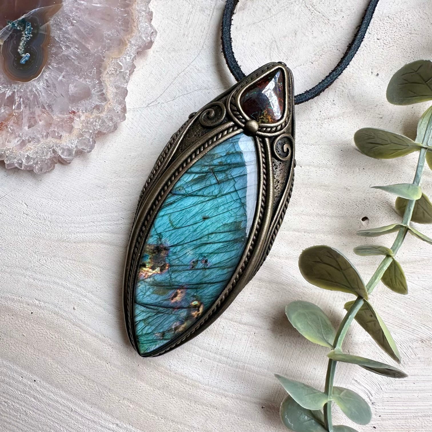 Large labradorite paired with boulder opal in a necklace