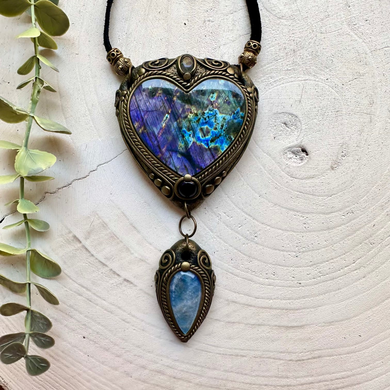 Handmade statement necklace featuring a large Purple Labradorite heart with Rainbow Moonstone, Clear Topaz and Amethyst.
