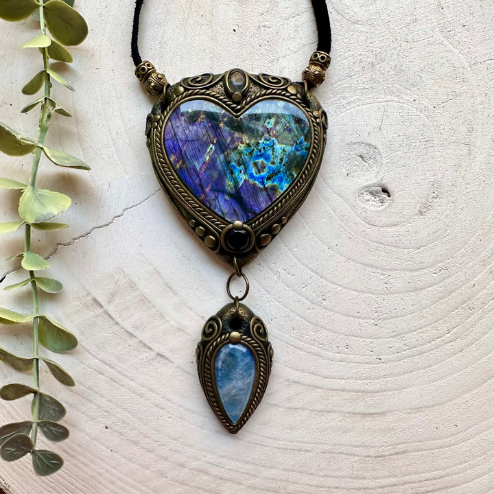 Handmade statement necklace featuring a large Purple Labradorite heart with Rainbow Moonstone, Clear Topaz and Amethyst.
