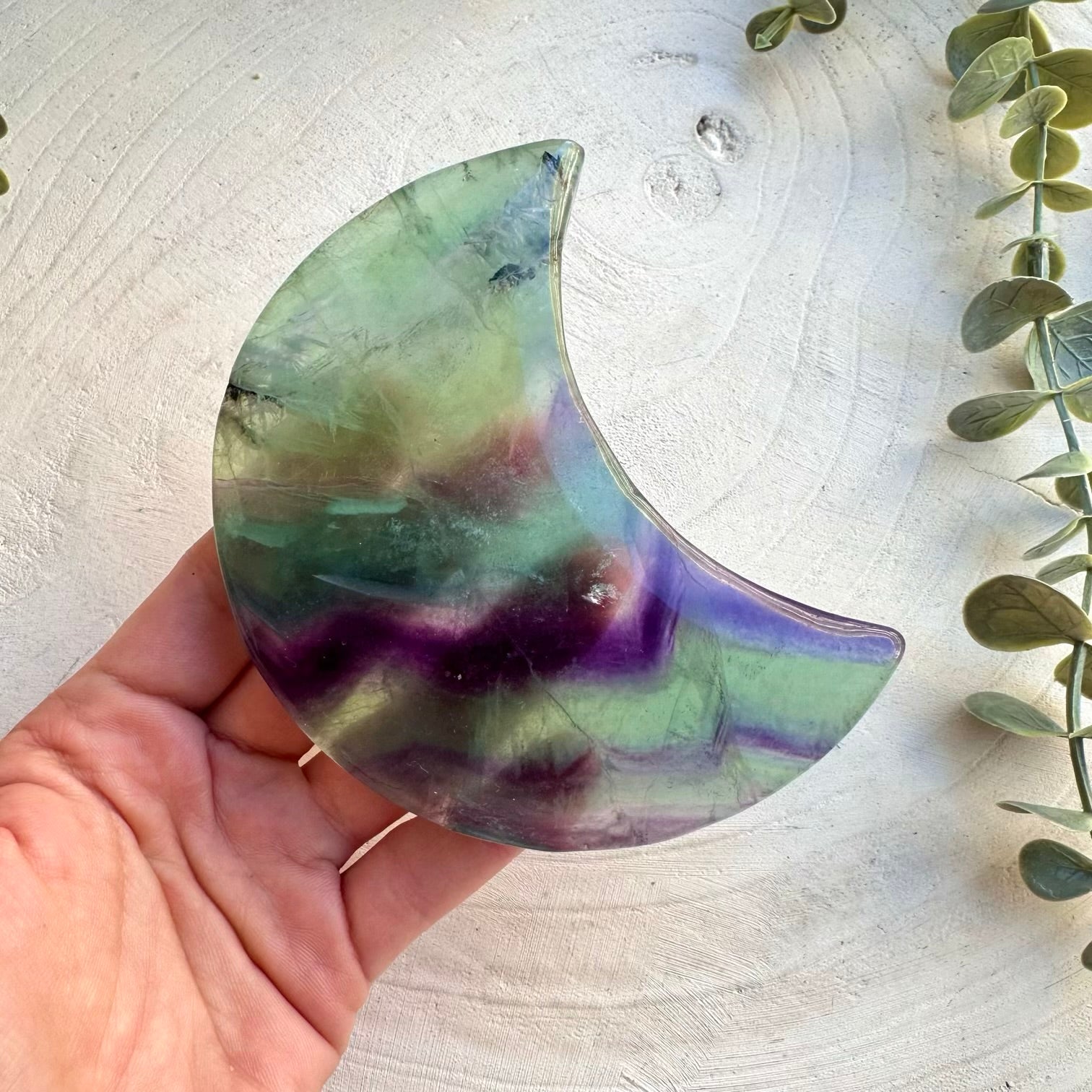 Large rainbow fluorite crystal moon