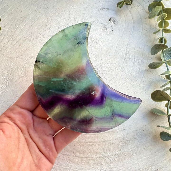 Large rainbow fluorite crystal moon