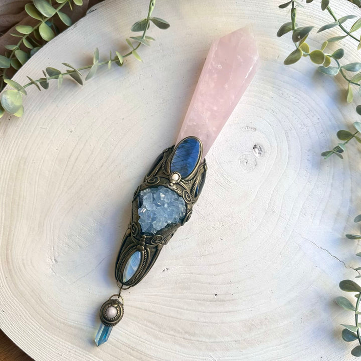 Large rose quartz crystal wand with celestite cluster and black onyx