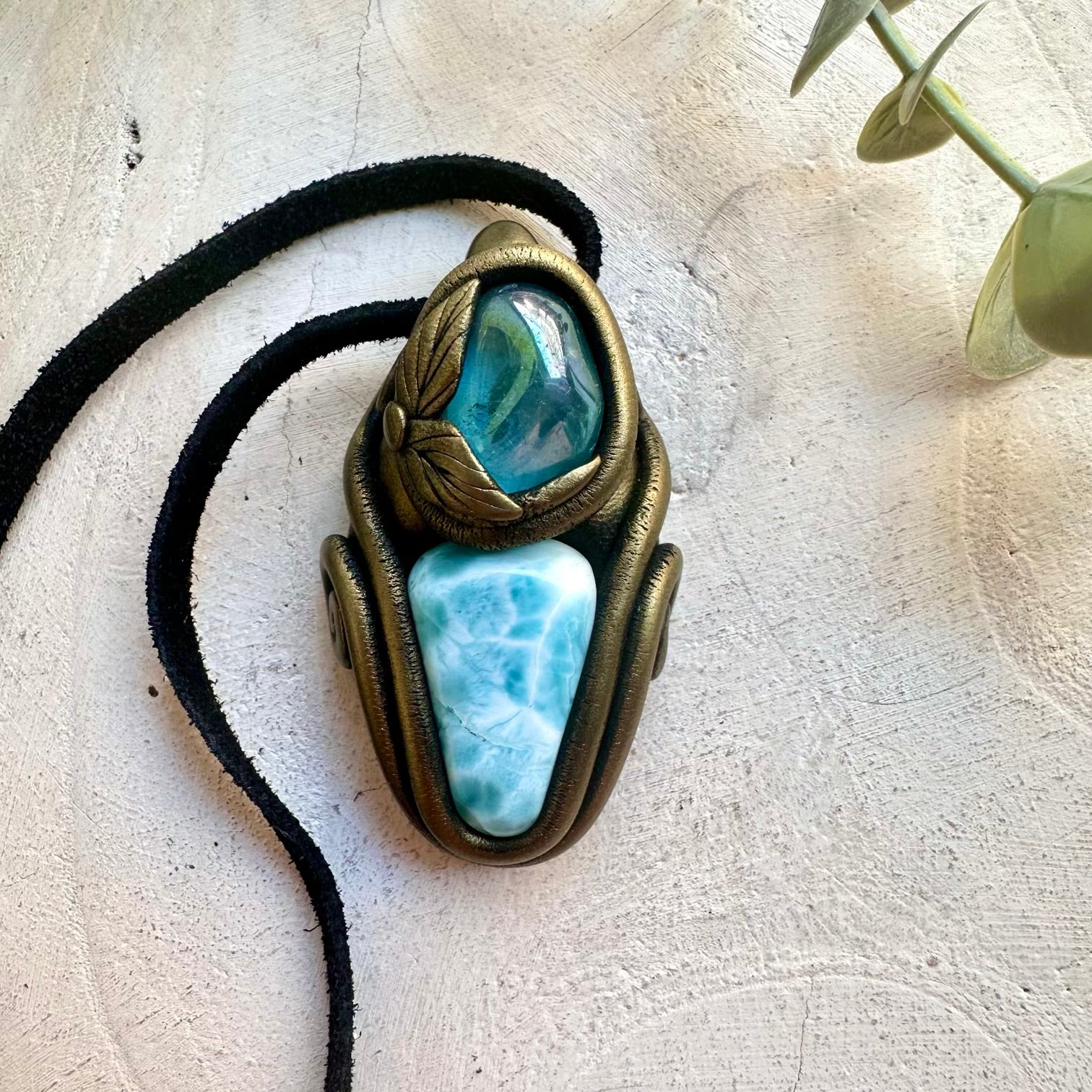 Unique artisan pendant crafted with genuine Larimar and Aqua Aura Quartz crystals.
