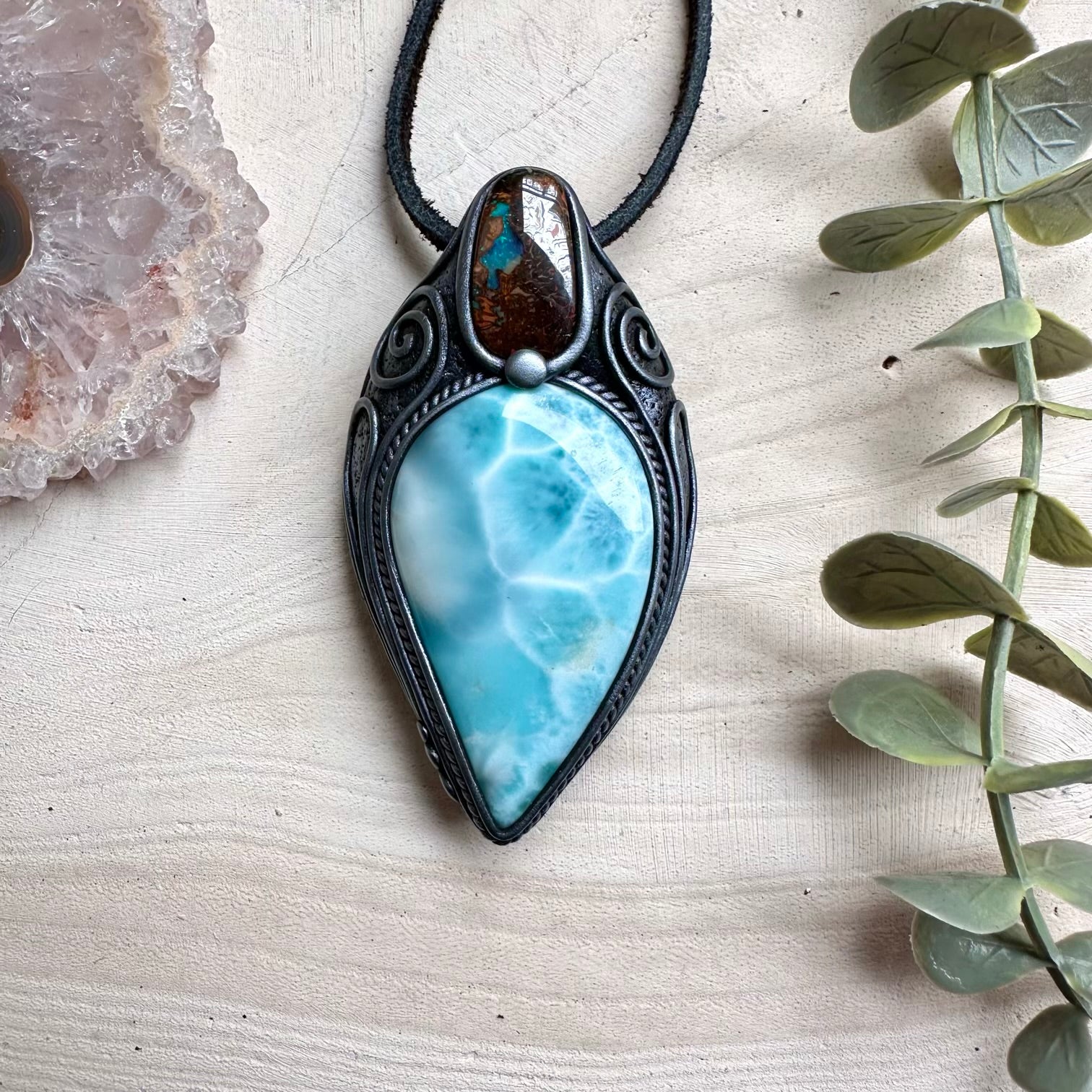Natural larimar paired with boulder opal in a necklace