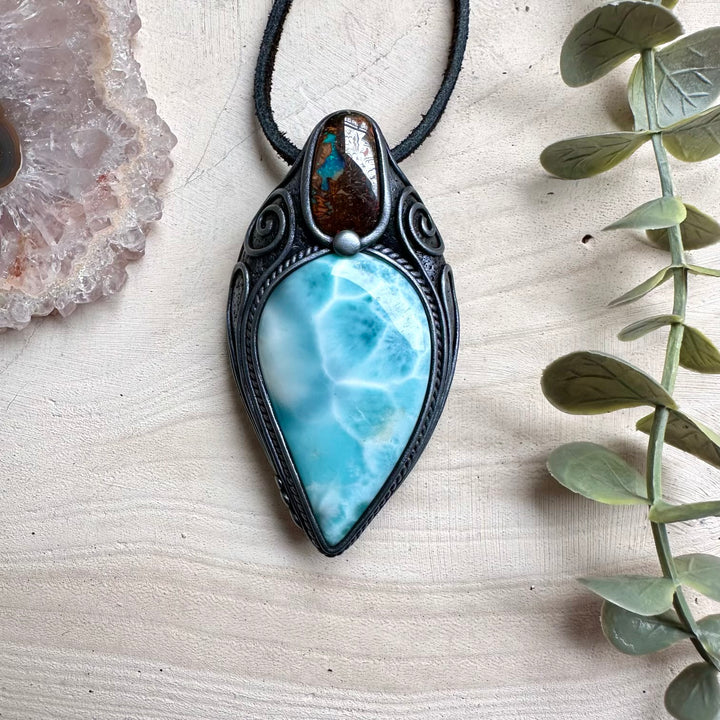 Natural larimar paired with boulder opal in a necklace