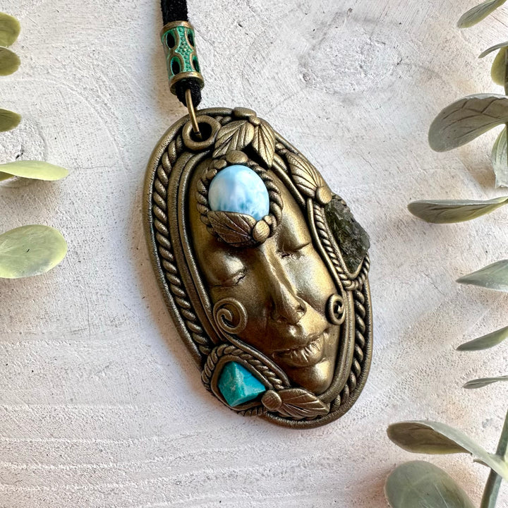 Natural gemstone jewelry combining Larimar with blue-green Chrysocolla and green Moldavite.