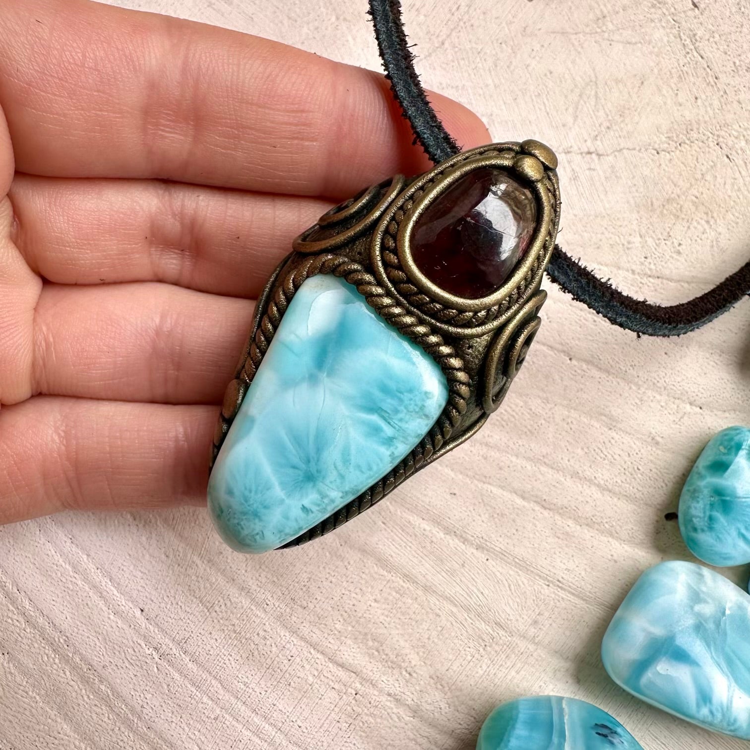 Handmade necklace with larimar and rhodolite garnet