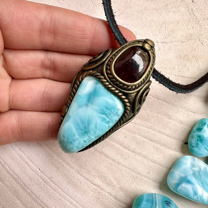 Handmade necklace with larimar and rhodolite garnet