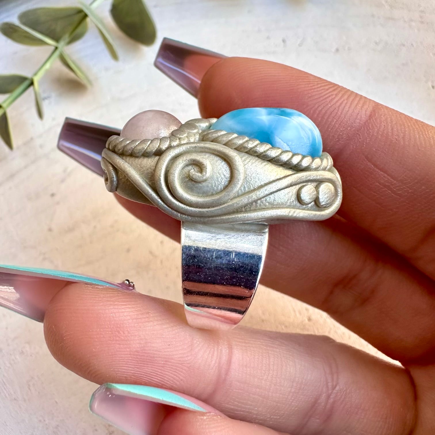 Spiritual jewelry ring combining larimar and morganite