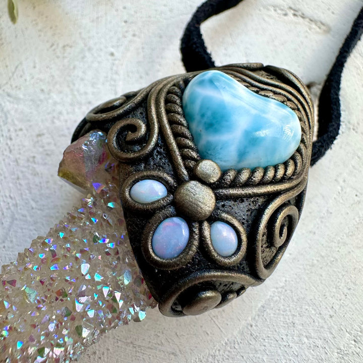Spiritual jewelry combining aura quartz larimar heart and opal