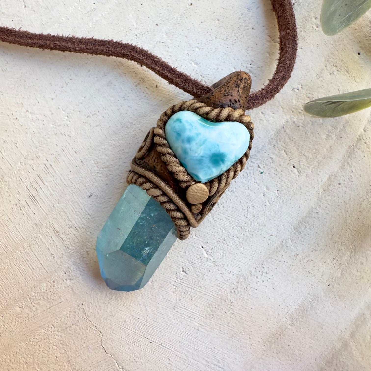 Handmade crystal necklace featuring Larimar heart and Aqua Aura Quartz