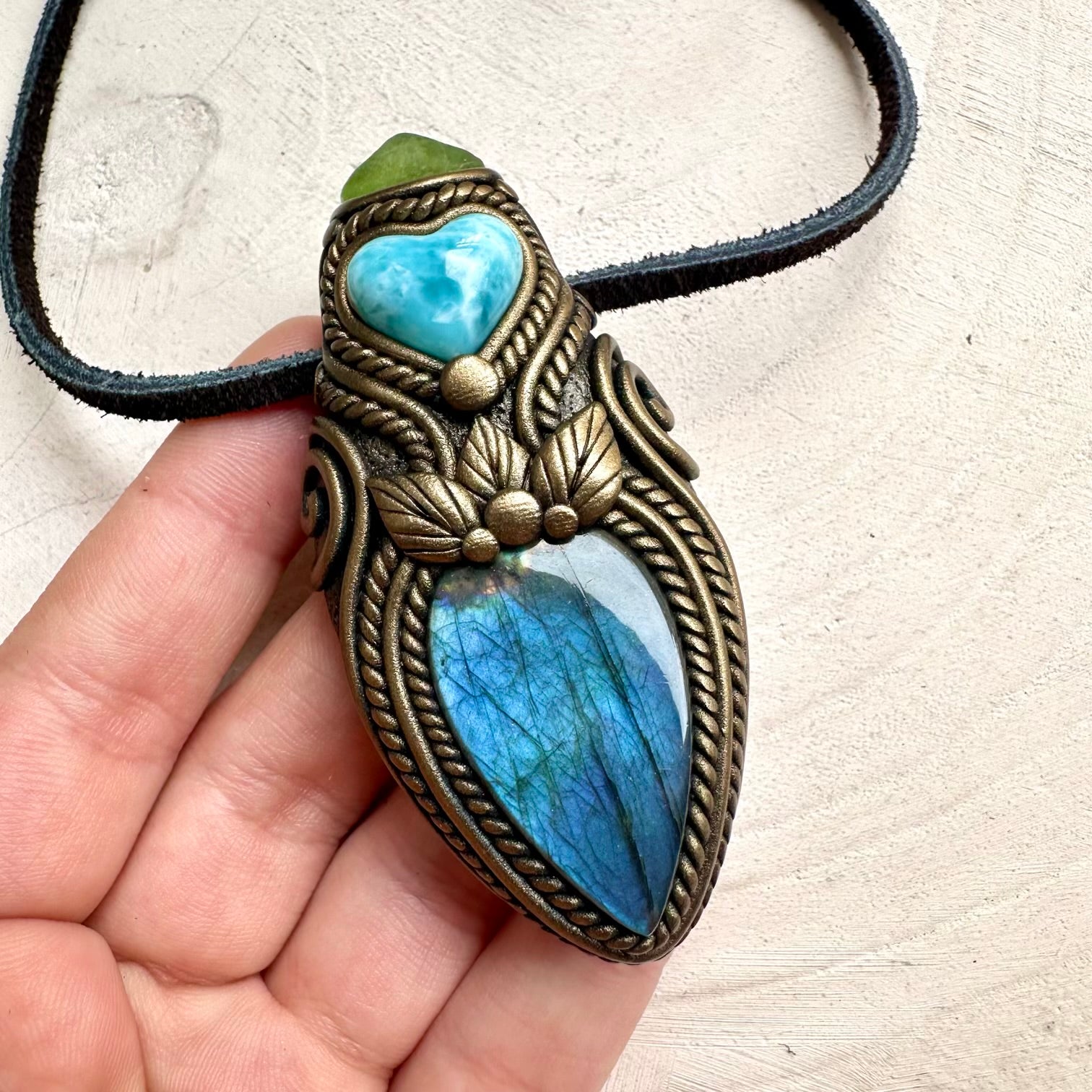 Larimar heart spiritual crystal necklace with labradorite gemstone and natural peridot details