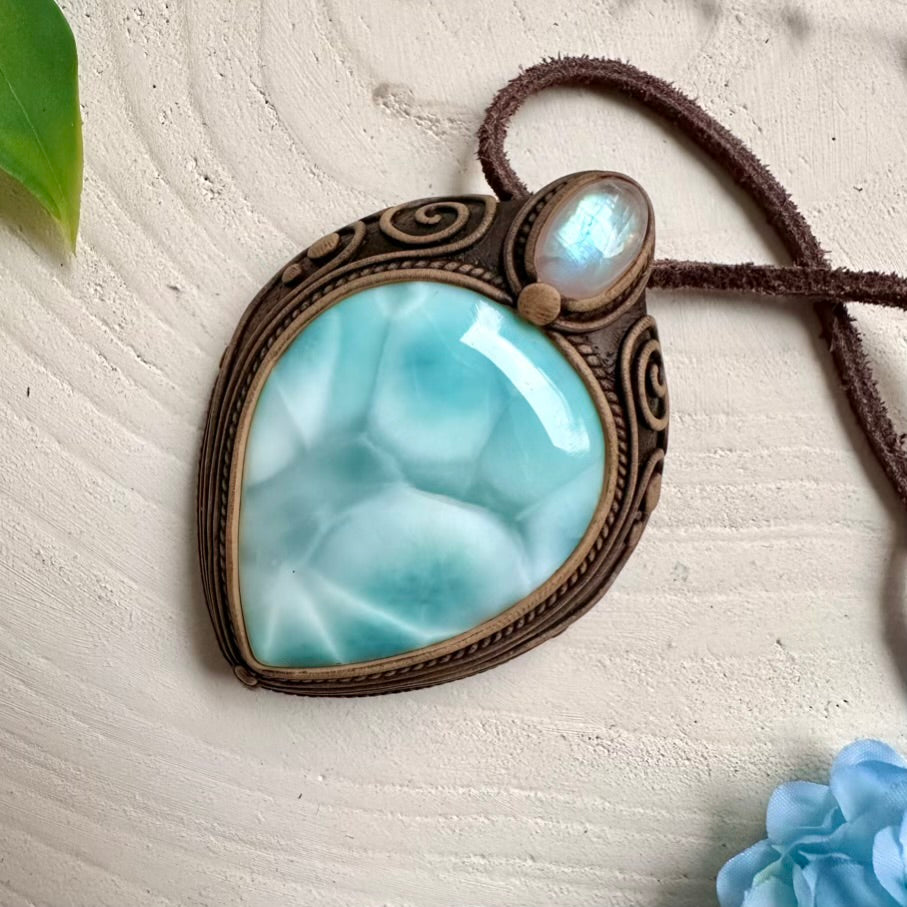 Larimar gemstone pendant accented with Rainbow Moonstone