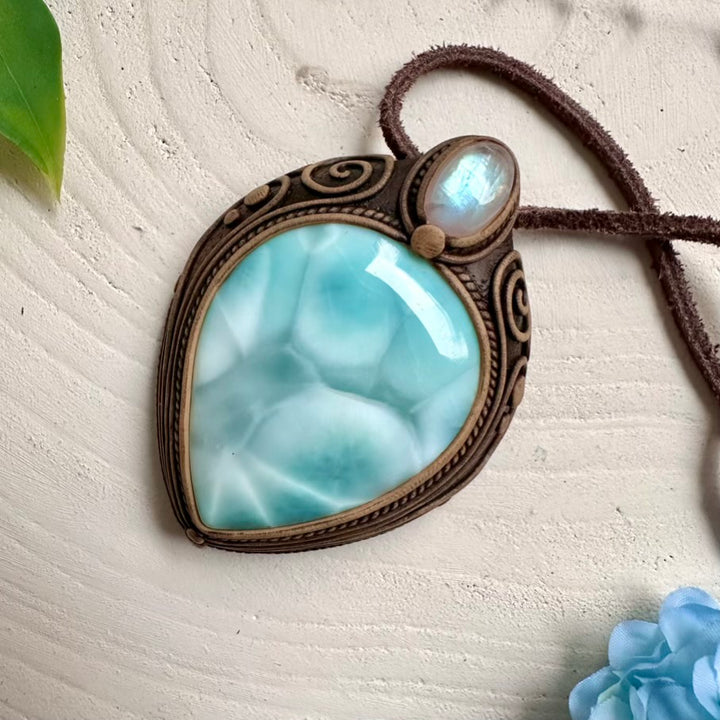 Larimar gemstone pendant accented with Rainbow Moonstone