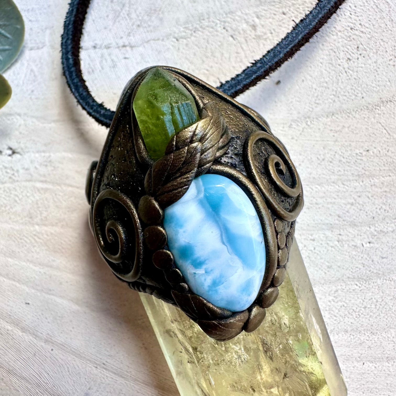 Spiritual jewelry combining citrine peridot and larimar