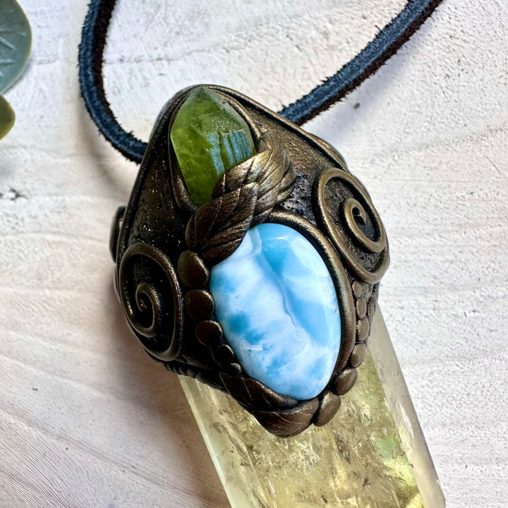 Spiritual jewelry combining citrine peridot and larimar