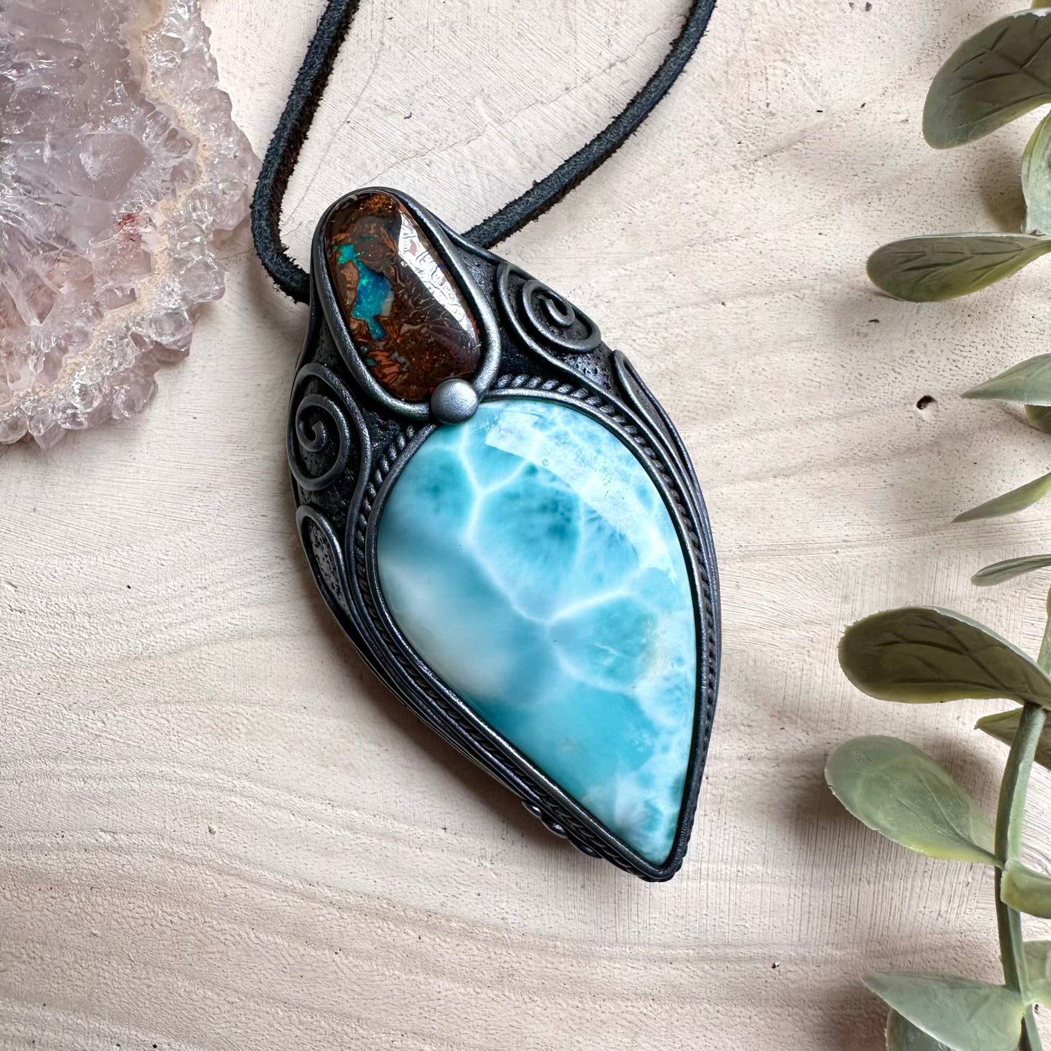 Handmade necklace featuring larimar and boulder opal