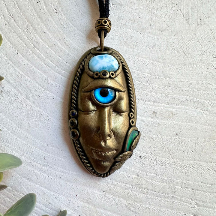 Unique Third Eye Goddess jewelry featuring Larimar with an iridescent Ethiopian Opal and Blue Sapphire.