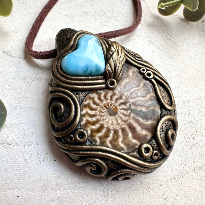 Ammonite and larimar crystal jewelry necklace with calming healing gemstone energy