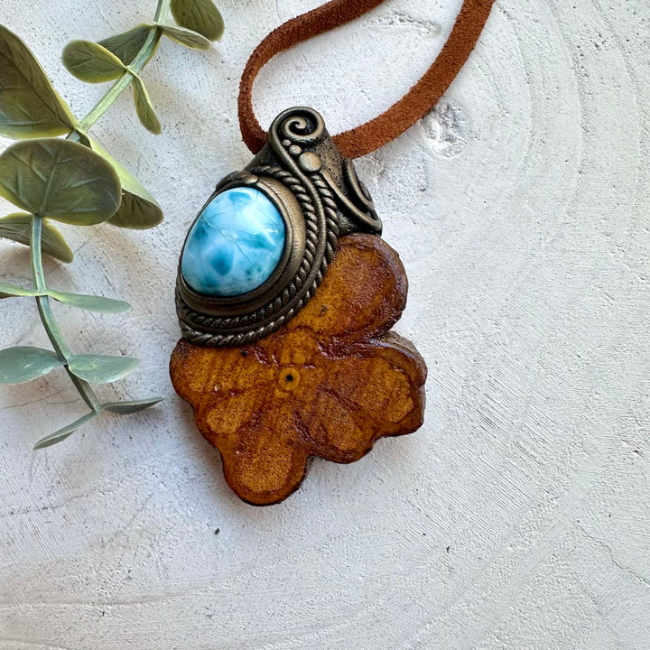 Shaman spiritual jewelry combining larimar and ayahuasca vine 