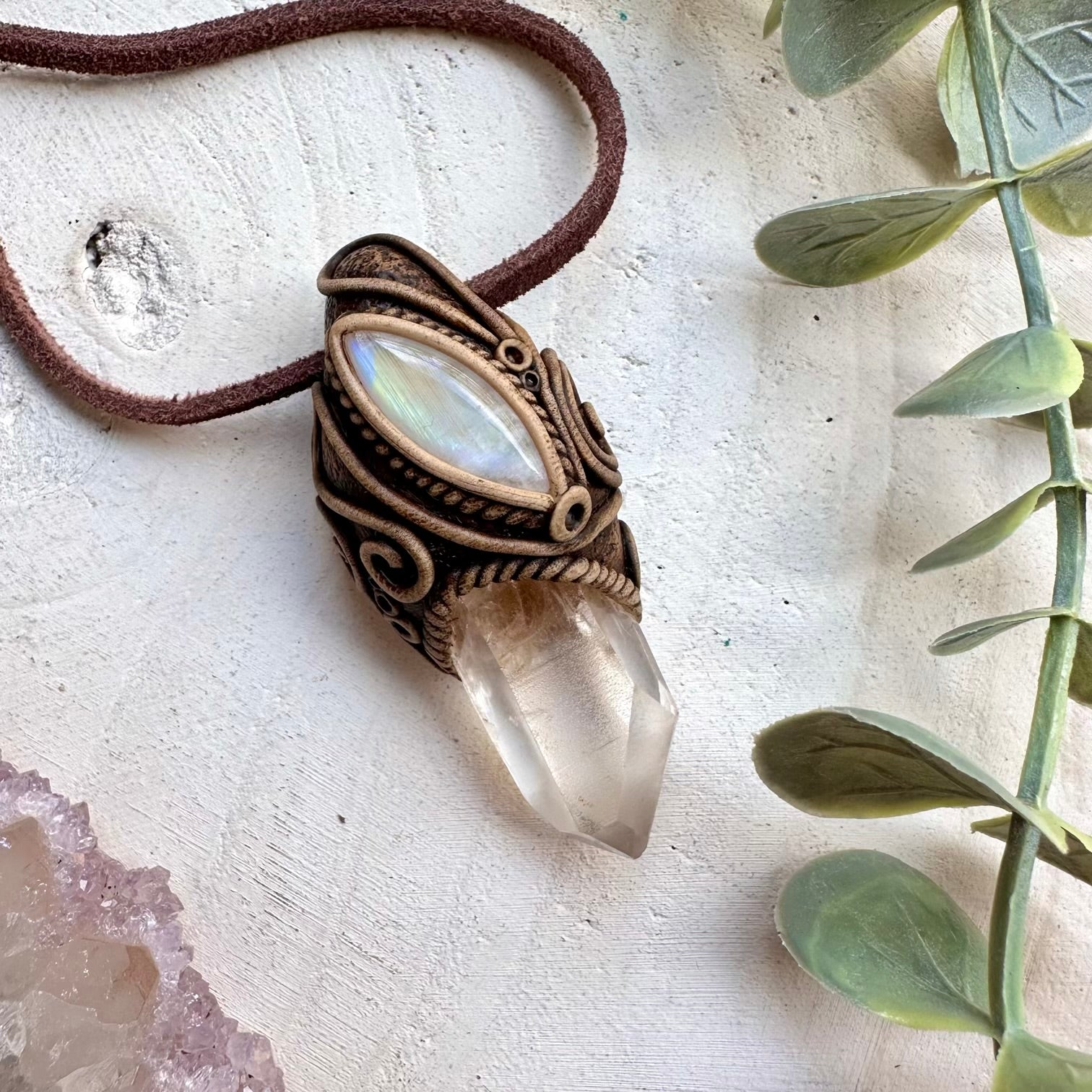 Lemurian quartz paired with rainbow moonstone in a necklace