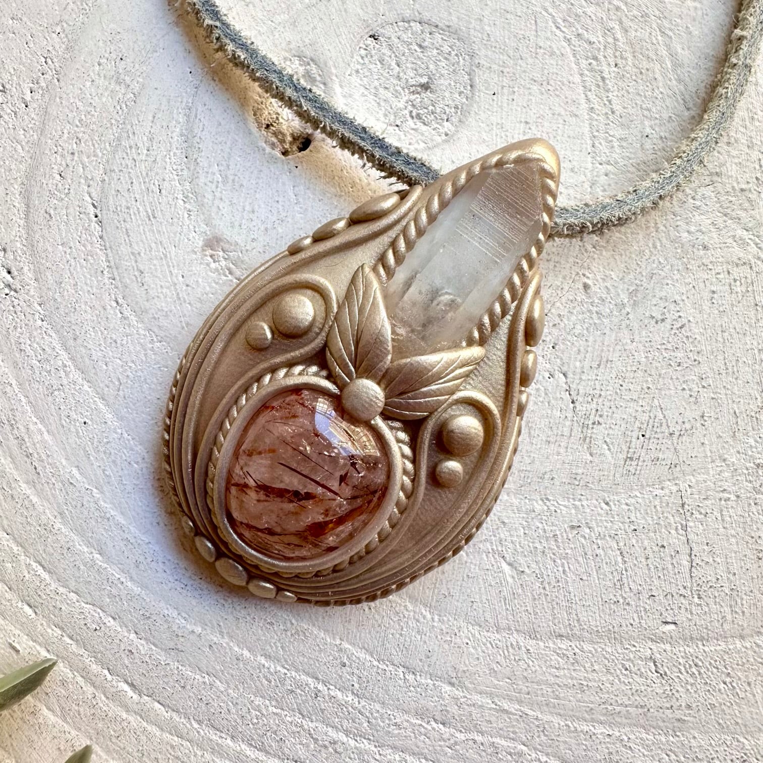 protection amulet crystal necklace with natural lemurian seed quartz point and polished hematite quartz