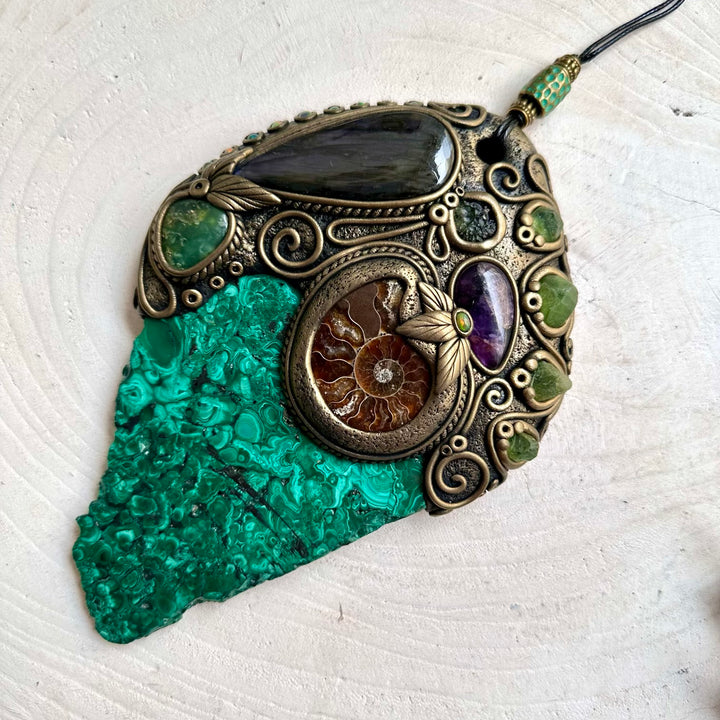 Handmade crystal altar decor showcasing Malachite with iridescent Labradorite, green Peridot and colorful natural gemstones.