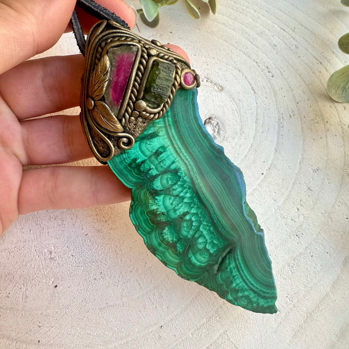 Malachite with watermelon tourmaline moldavite and rhodolite garnet crystal wand necklace