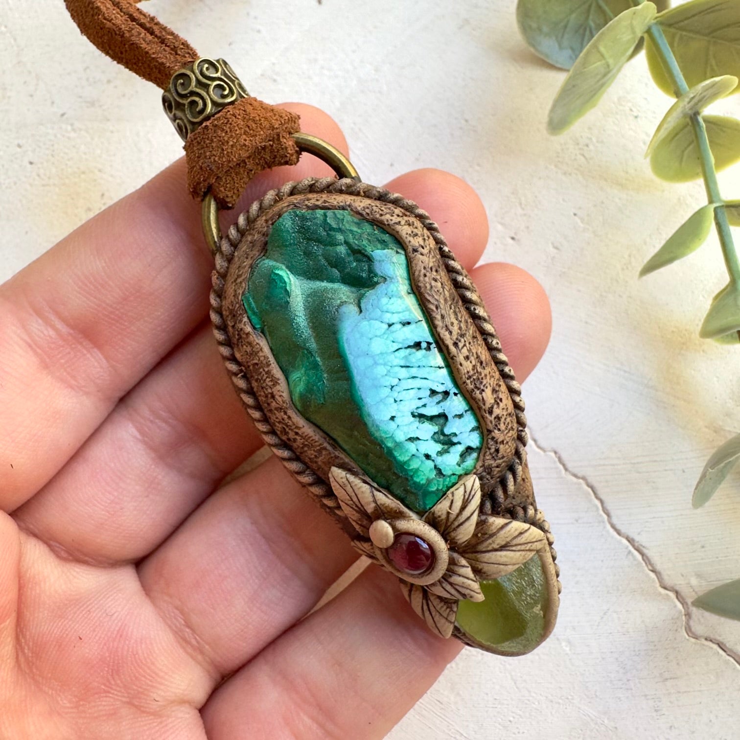 Half polished malachite necklace with peridot and rhodolite garnet