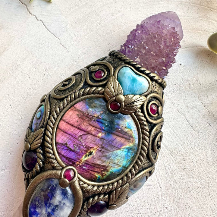Handmade energy wand combining Rainbow Fluorite, Labradorite, Larimar and Rhodolite Garnet.