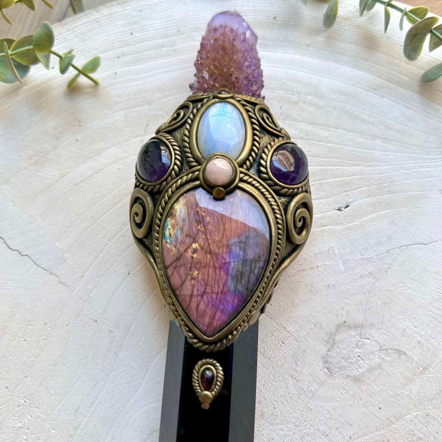 Handmade ritual tool crafted with Black Obsidian and a beautiful selection of healing crystals.