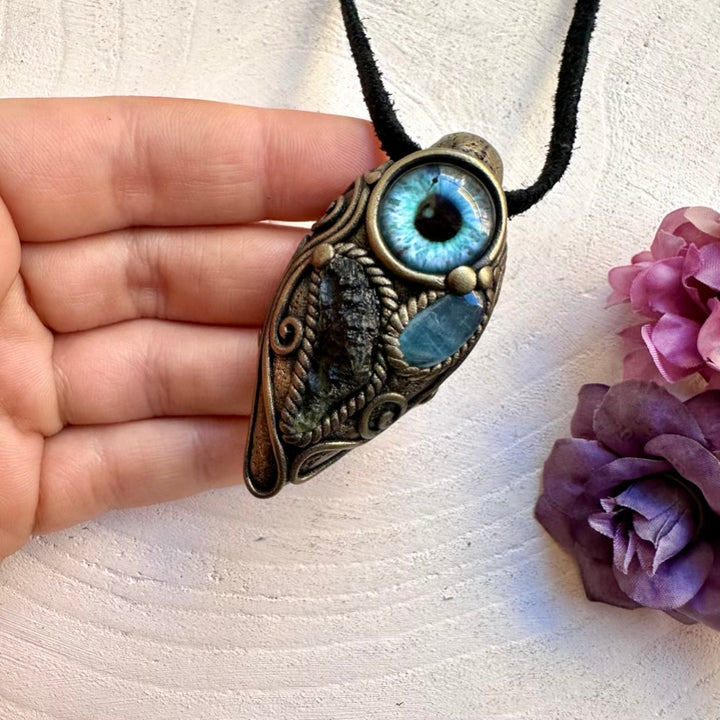 Handmade Moldavite crystal and Aquamarine protective eye pendant, ethically sourced spiritual healing necklace talisman.