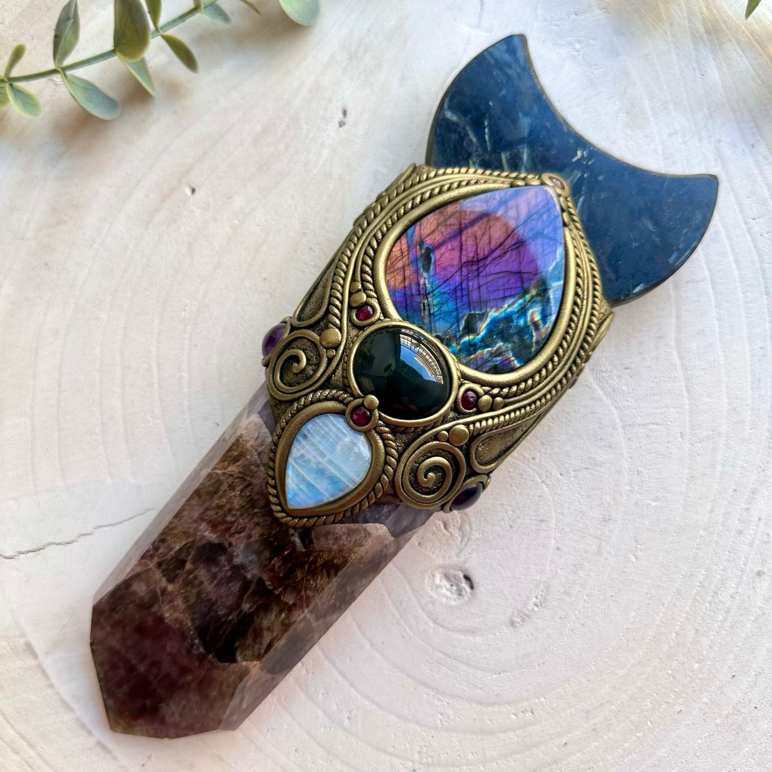 One of a kind healing crystal wand featuring Super Seven Quartz, Amethyst and Rhodolite Garnet.
