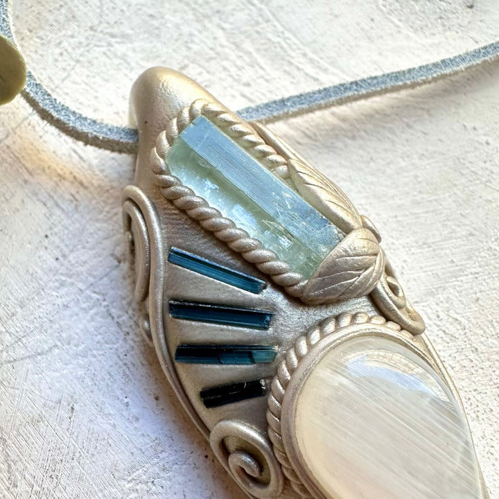 Energy pendant with aquamarine blue tourmaline and moonstone