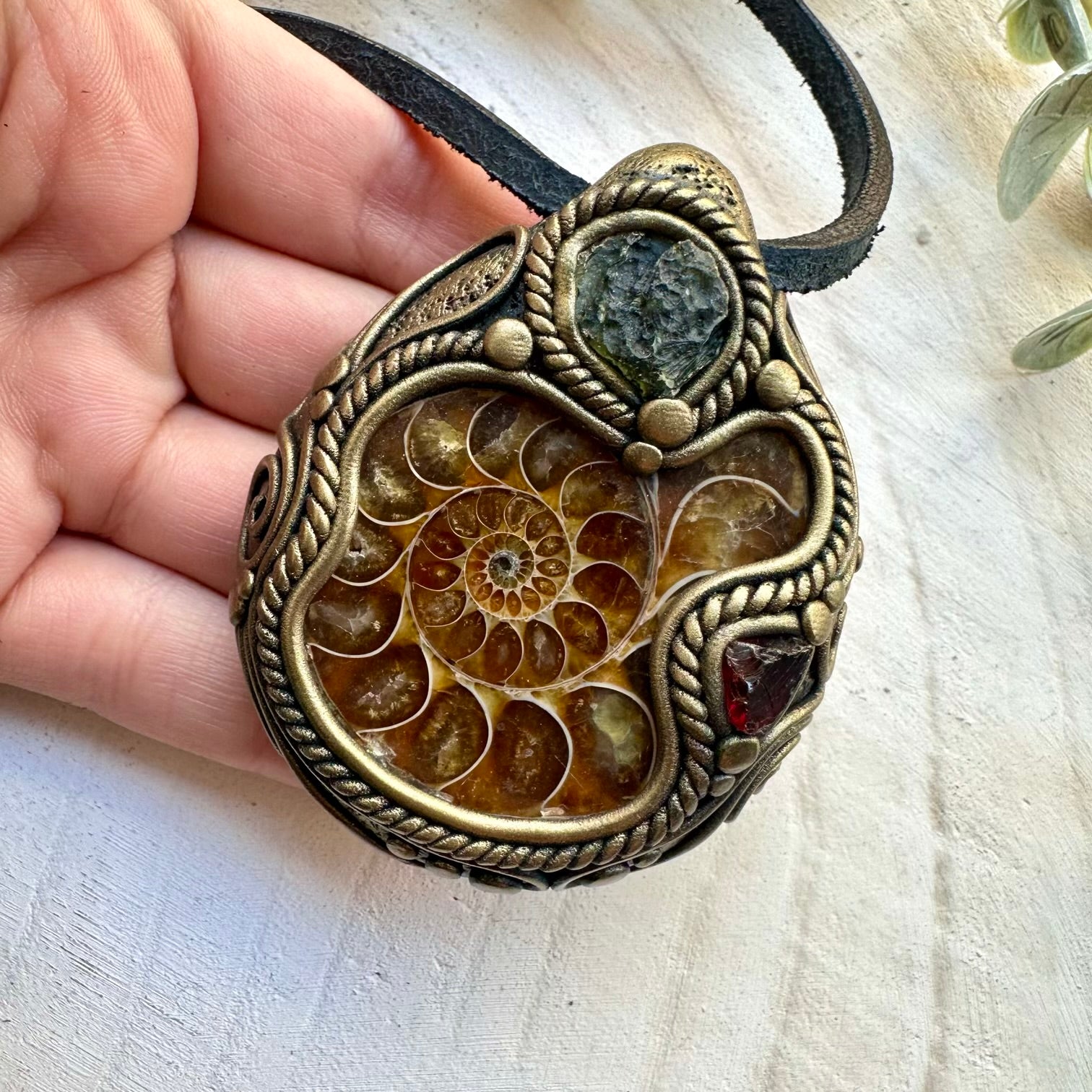 Moldavite ammonite and garnet unisex spiritual jewelry