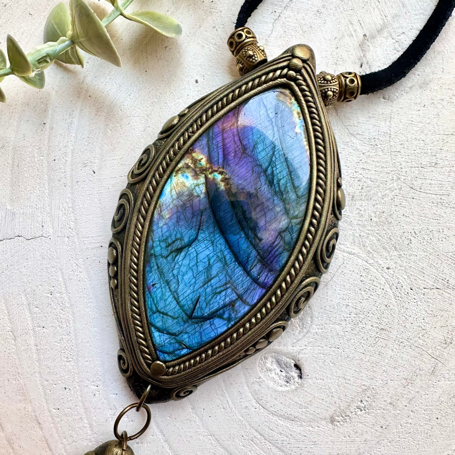 Natural gemstone jewelry highlighting the vibrant flashes of a gorgeous large Labradorite.