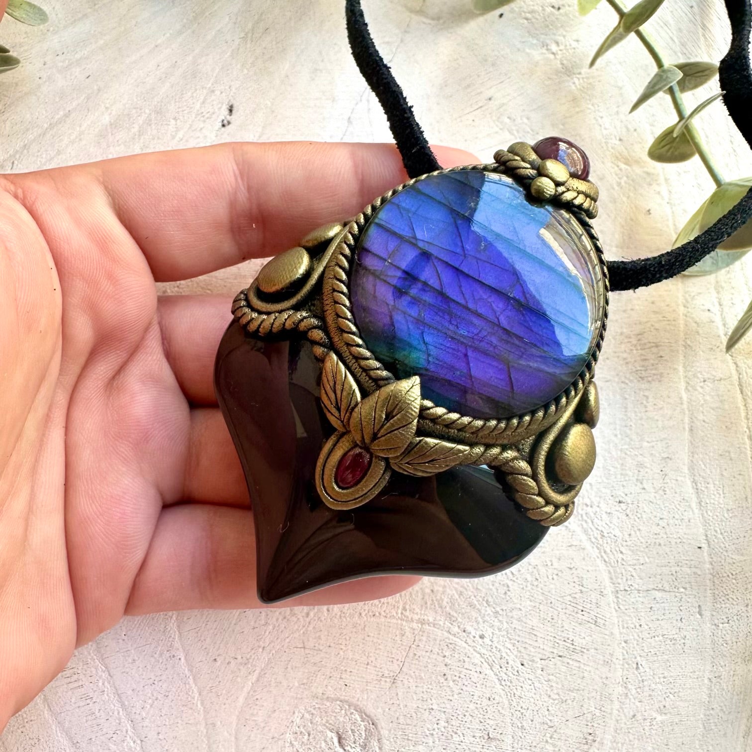 Unique gemstone pendant combining Rainbow Obsidian, Labradorite, Ruby and Rhodolite Garnet.
