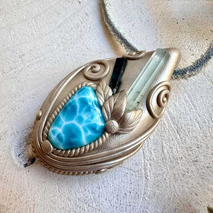 Healing crystal jewelry featuring Larimar, Aquamarine and Blue Tourmaline