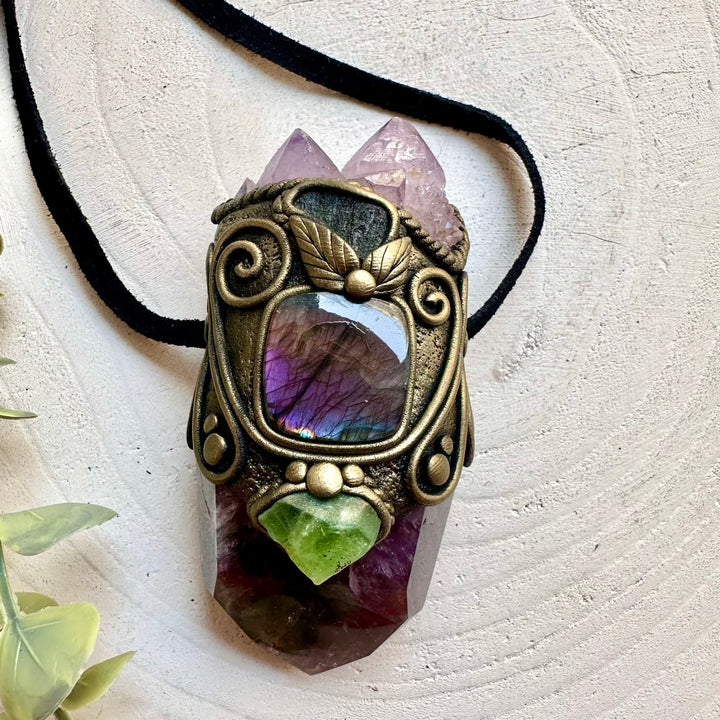Handmade ritual tool crafted with Super Seven Quartz, Moldavite and Peridot for manifestation, spiritual practice and intention setting.