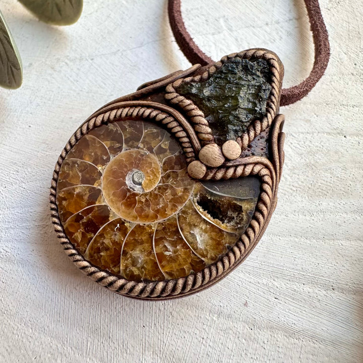 Natural gemstone necklace with moldavite and ammonite fossil