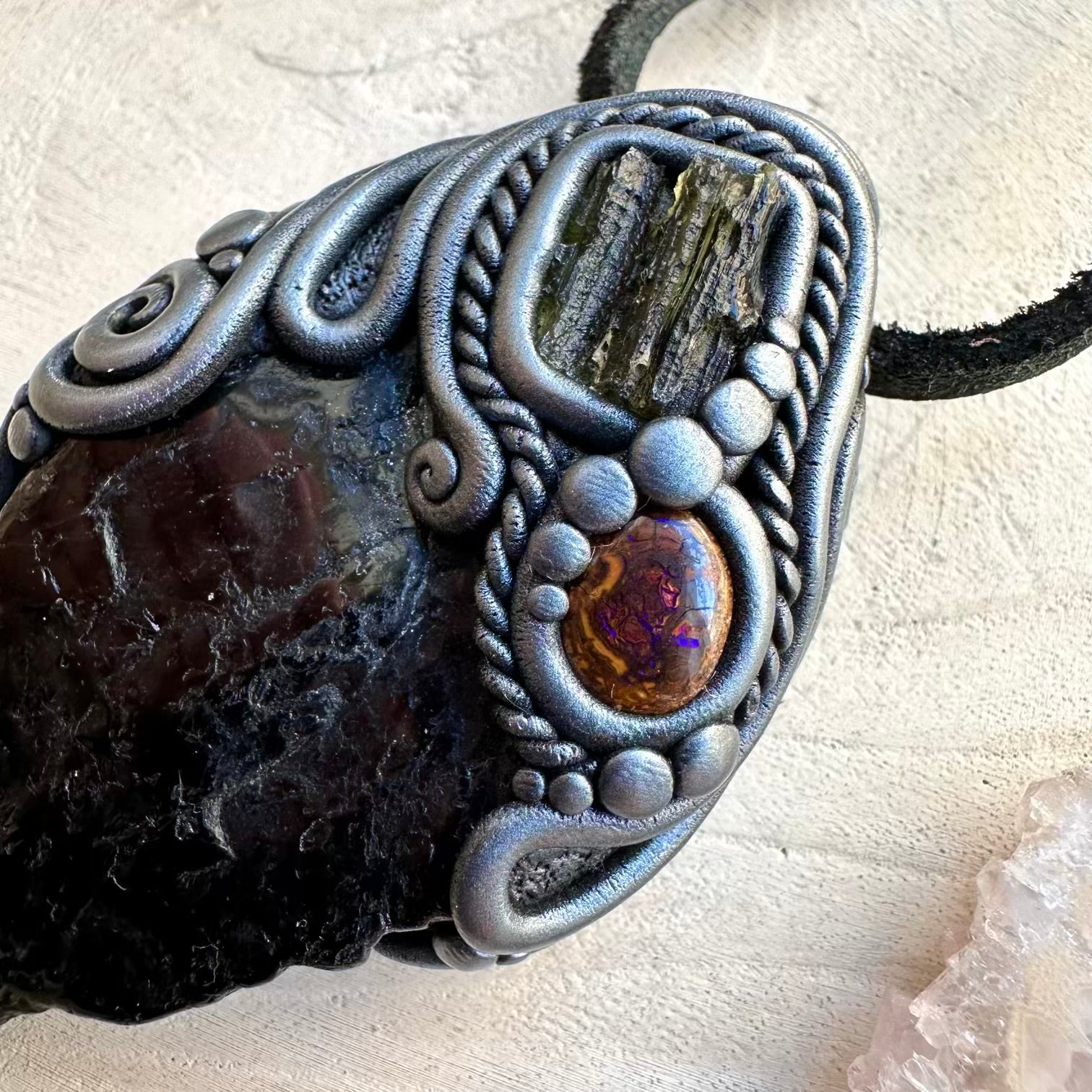 Handmade moldavite and tourmaline healing jewelry