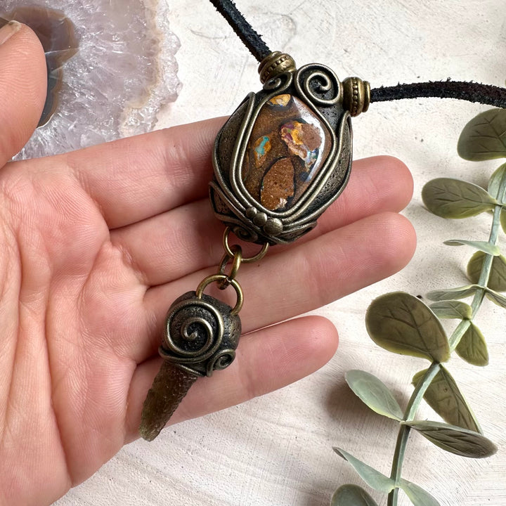 Spiritual jewelry combining moldavite and boulder opal