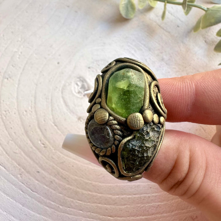 Handmade statement ring with Moldavite, Peridot and Clear Topaz natural gemstones.