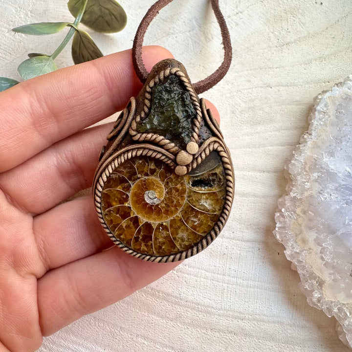 Unique ammonite fossil pendant necklace with moldavite