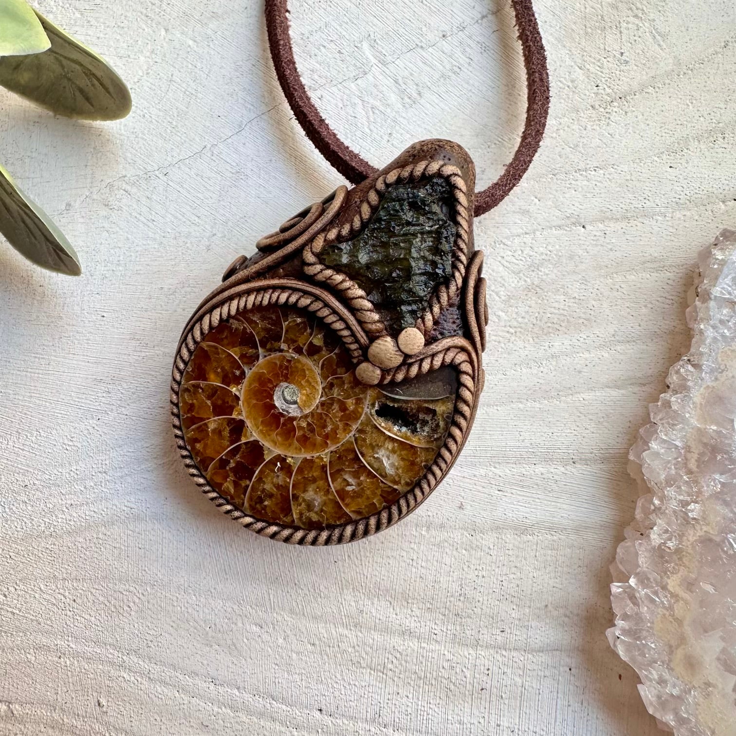 Healing crystal pendant with moldavite and ammonite