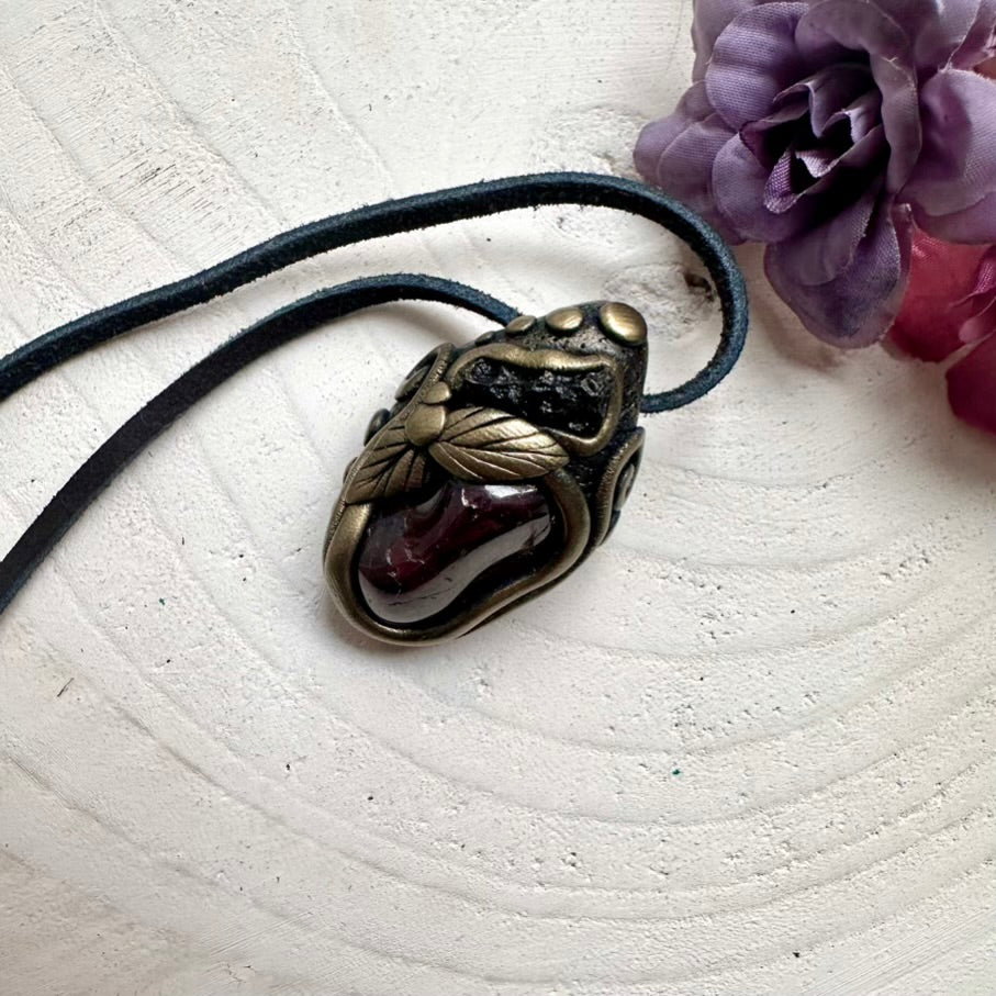 One-of-a-kind Moldavite pendant paired with natural Red Garnet, wearable spiritual crystal energy tool.